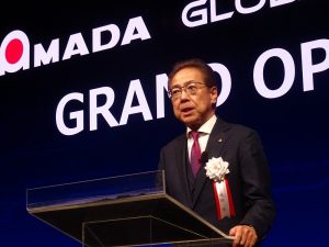 Mr Tsutomu Isobe, President of AMADA, says: "We are moving from 'what can we do' to 'why can we do it'".