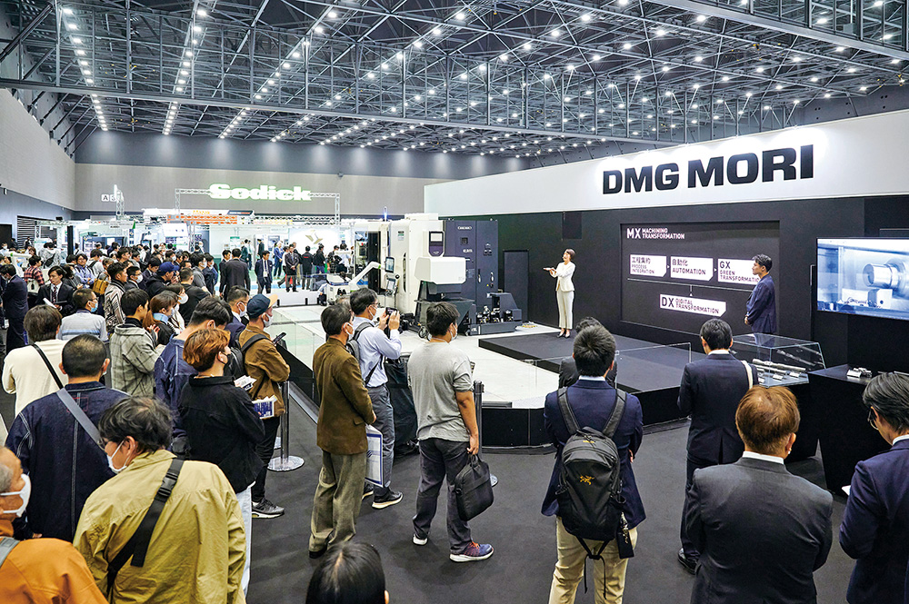DMG MORI had a large stage in the center of its booth for presentations. 