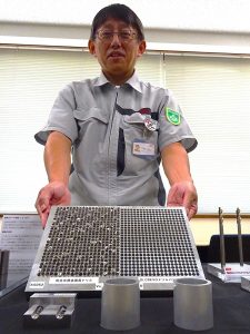 Toshihiro Hoshiba, Technical Manager of the company's Cutting Tool Division, shows his confidence in the new product by saying, "With our burrless, it has to be this clean" (hole machining on the right). 