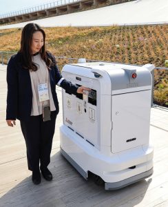 The robot stops when a person stands next to it. 