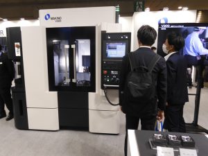Makino showcased the V300 vertical machining center. 