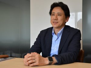 Masaki Murai, representative chairperson of the Chubu Buhin Kakou Association, says the system reduces workloads for both customers and Murai.