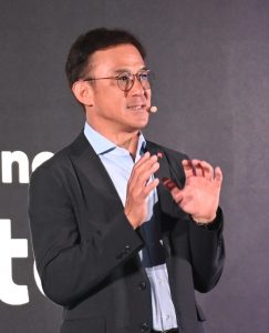 Yoshinami Takahashi, Corporate Executive Officer, Corporate Vice President, COO in charge of Solution Services, and Head of Global Solutions, Fujitsu