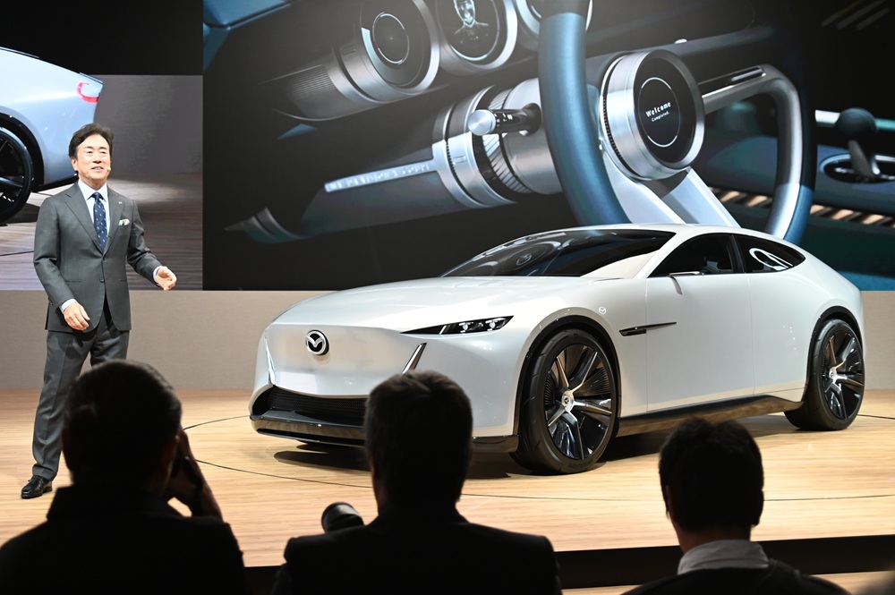 Mazda President and CEO Katsuhiro Moro introduces the “Mazda Vision X Coupe.”
