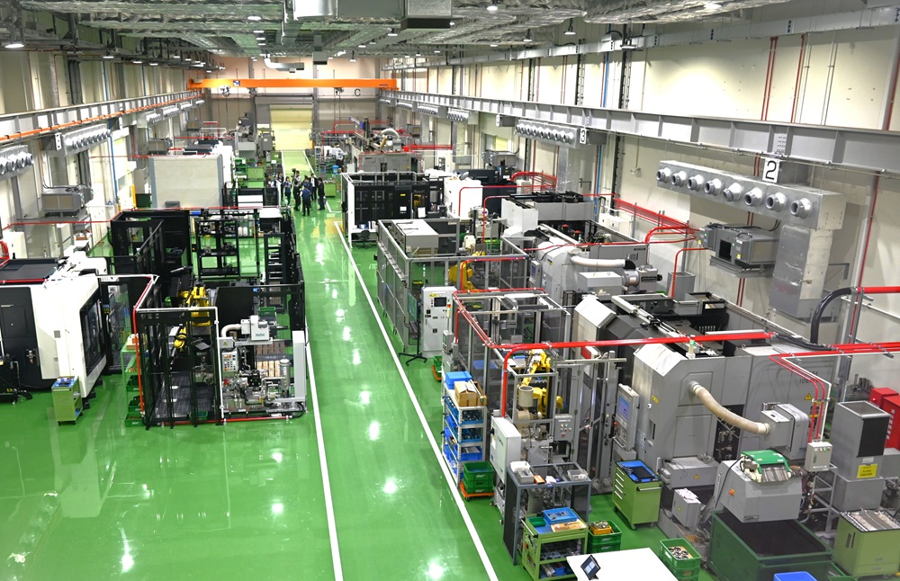 Visitors can observe the manufacturing floor from the second floor of the new factory.