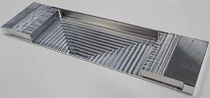 Thin-wall machining using AI-derived machining conditions. The thickness at the center of the bottom is 1 mm.