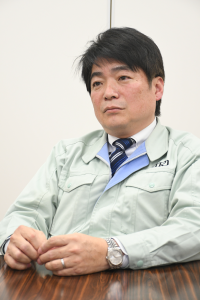 Takeharu Oka, Senior Managing Director of TRI ENGINEERING, who also serves as chairman of the Robot Machining Technology Symposium 